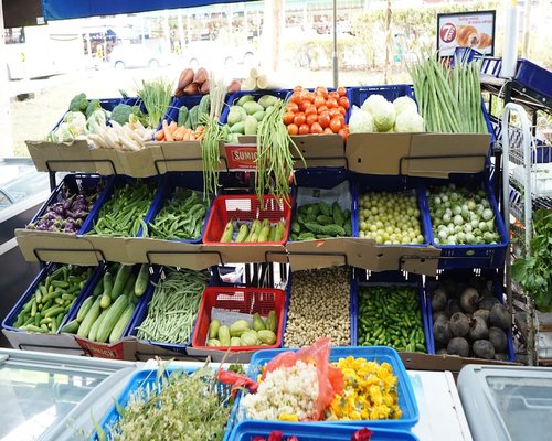 Fresh wholesome ingredients such as lean fish eggs tofu and assorted colourful vegetables bought from a local Singapore supermarket arranged cleanly